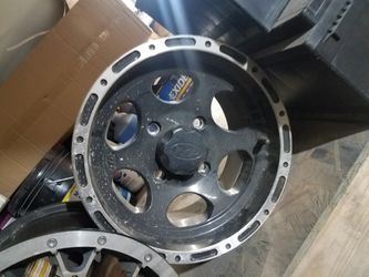 2-12" ITP Rims. 2008 arctic cat 4x4