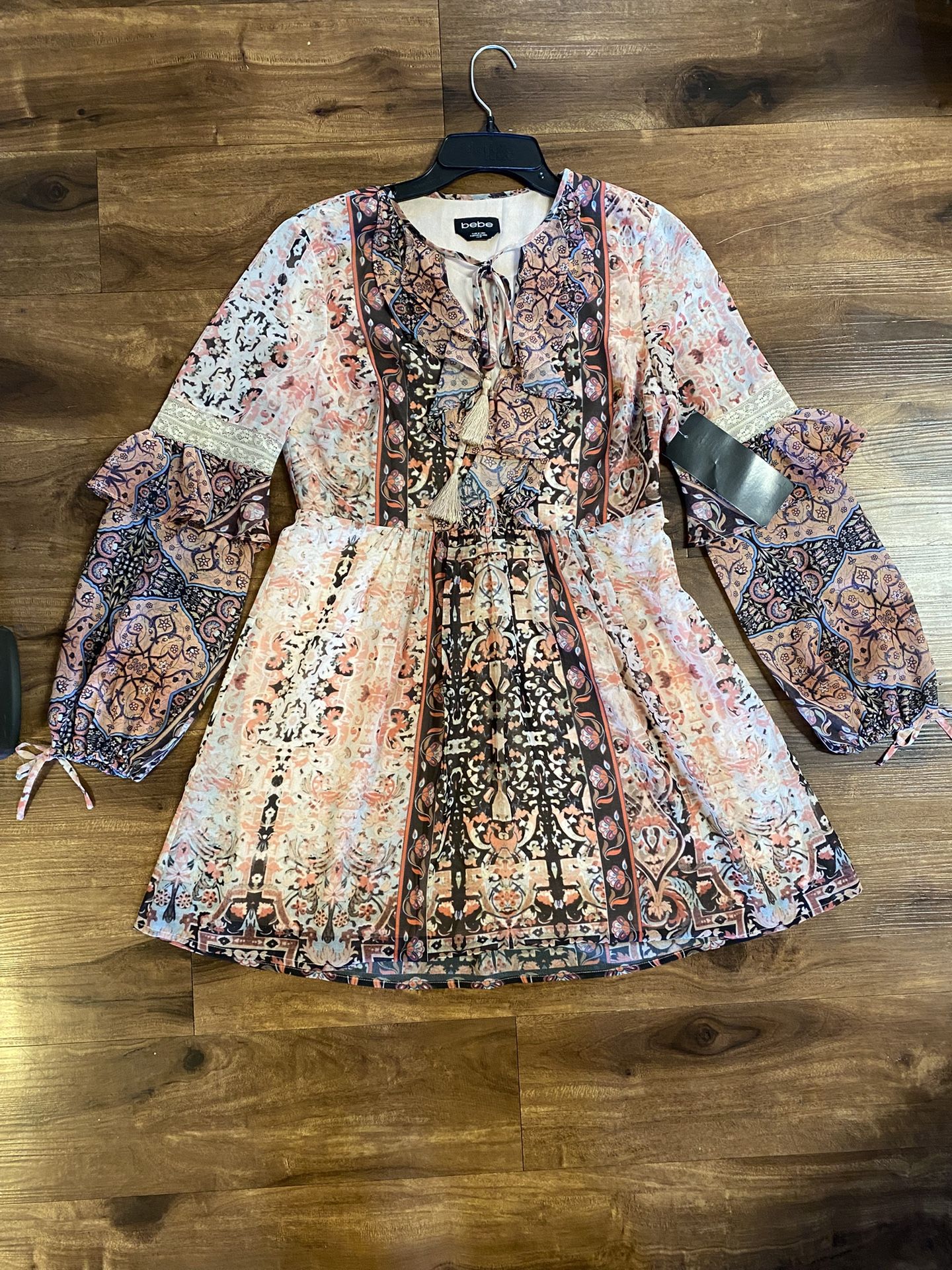 Brand new woman’s Bebe brand pink dress up for sale