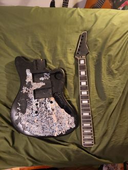 Damaged guitar body blank and neck