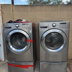 LG Washer and dryer set With Pedestals
