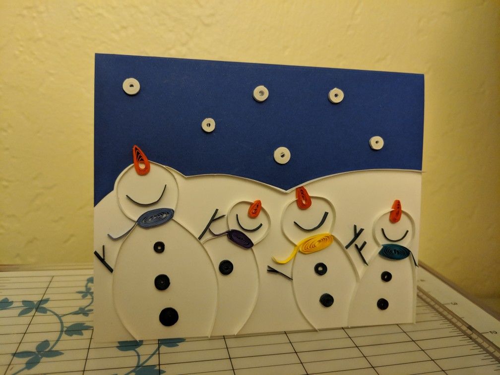Quilled Christmas greetings cards, and snowflakes ornaments.