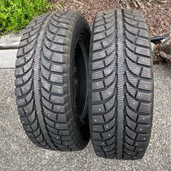 2 Studded snow tires with rims