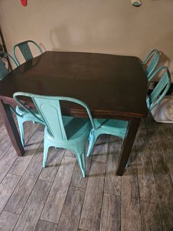 Wood table with metal chairs