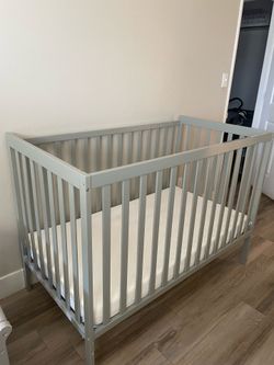 Baby crib with mattress
