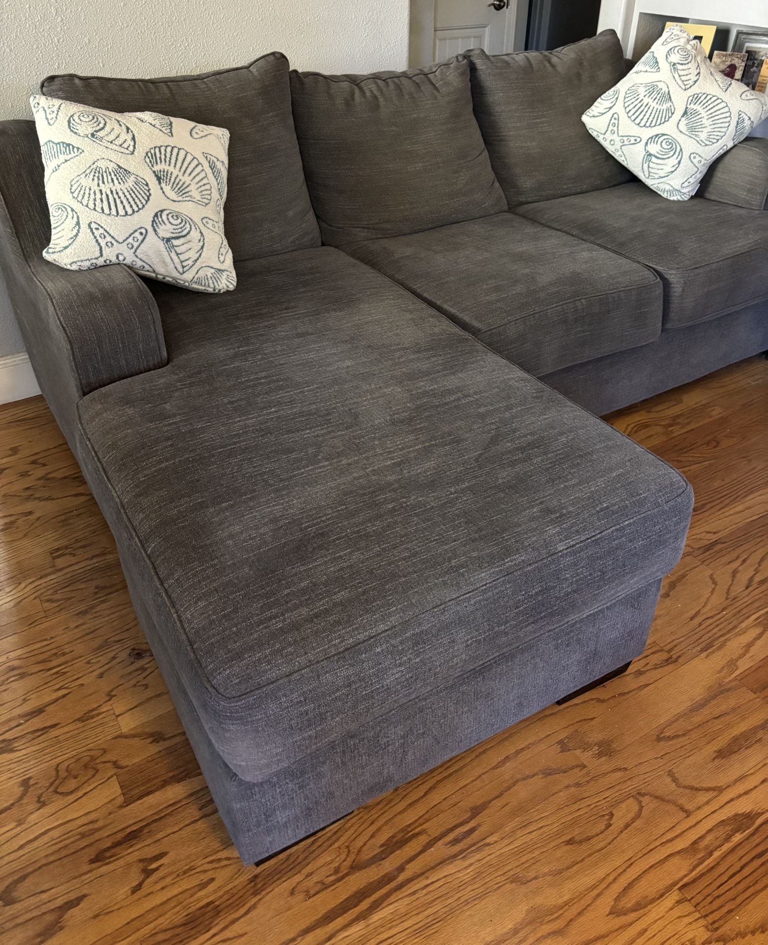 Living Spaces~ Charcoal Grey Sofa with Reversible Chaise
