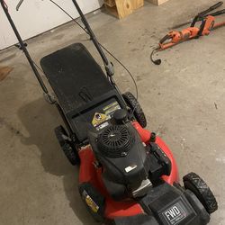 Lawnmower and hedge trimmers