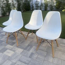 4 Stylish White Chairs