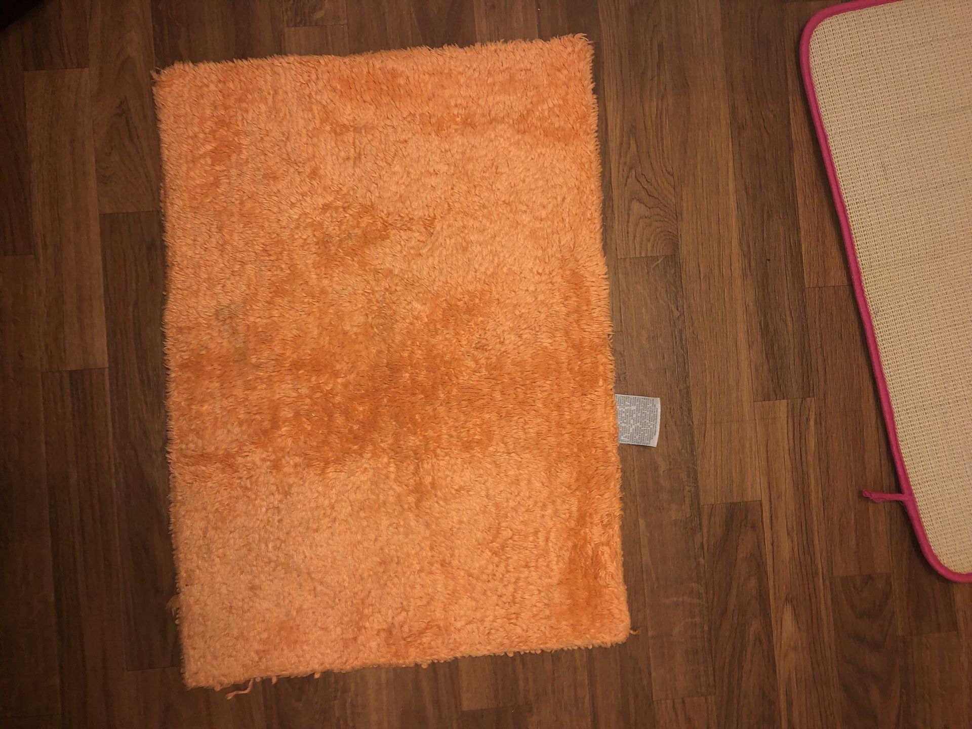 Orange bath mat