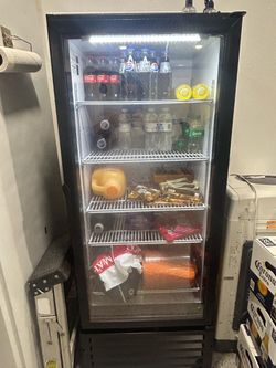 Commercial glass-door display refrigerator – 5 feet long and 2 feet wide