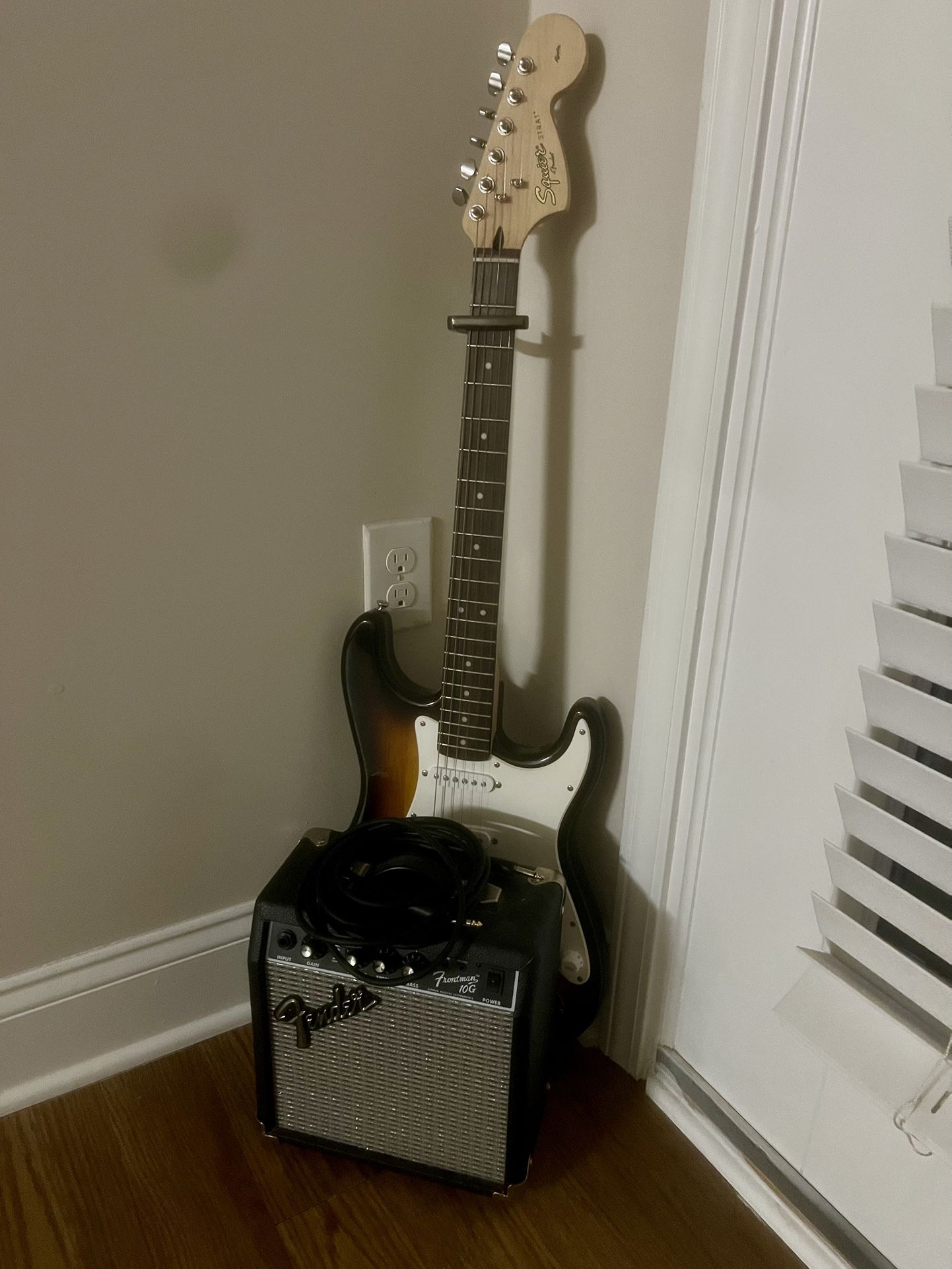 Squier Strat by Fender Electric guitar With Amp