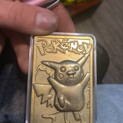 23 carrot gold Pokémon traipsing cards with Poké ball box and certification of authenticity