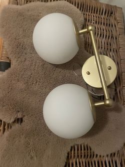 Bathroom fixture 2-light available if posted