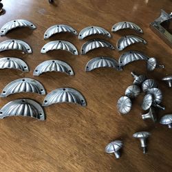 Hardware: 12 silver knobs and 15 silver pulls