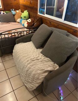 Couch and pillows (blanket not included)
