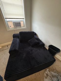 Black chaise lounge chair