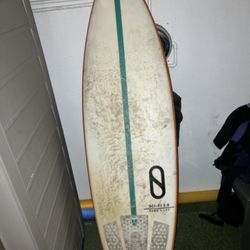 slater design surfboard 