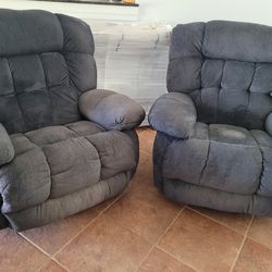 Two swivel rocker recliners