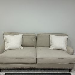 Beige Linen Couch With Accent Pillows