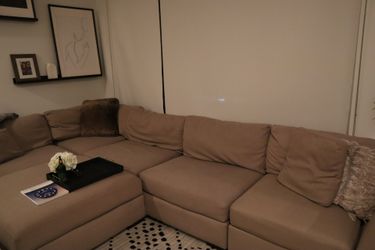 Tan 4-piece Sectional With Ottoman