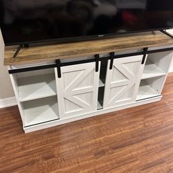 TV stand dressed like new