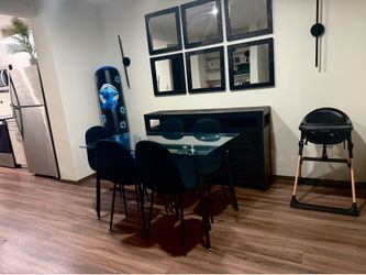 Glass Dining Table with 6 Black Chairs