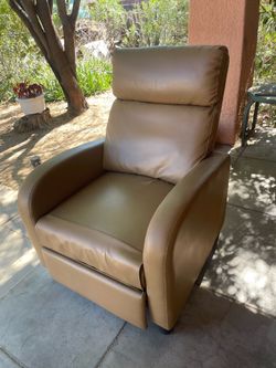 Vintage tan recliner chair