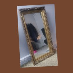 Vintage gold framed mirror....