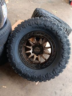 17x9 lock rims 6 lug 6x139 6x5.5 on new tires 33 1250 17 lt