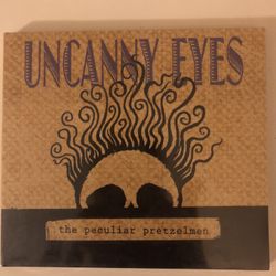 Uncanny Eyes by The Peculiar Pretzelmen