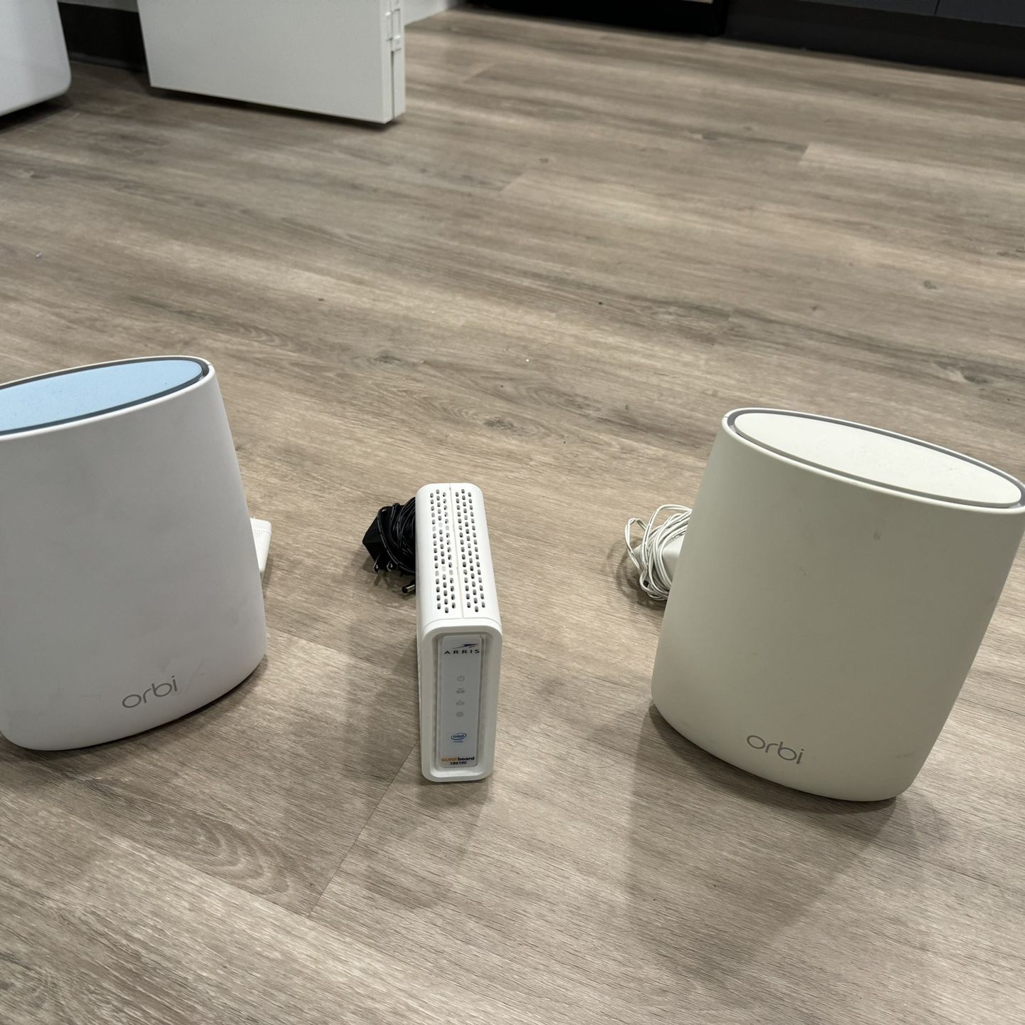 House Orbi Wi-Fi System with Arris modem