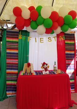 Mexican backdrop and ballon garland decor