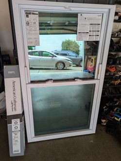 Brand new 32 x 54 vinyl window