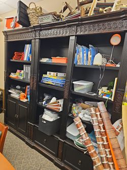 large, ornate traditional-style bookcase/cabinet