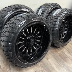 New 22x12 gloss black wheels wrapped in RBP 285/45r22 tires 