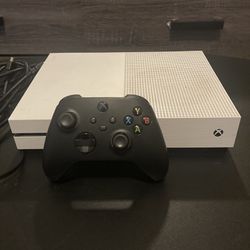 Xbox One S and a Black Xbox Controller 