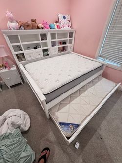 Full bed with bookcases hutch, trundle and 2 mattress