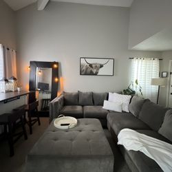 Lightly Used Gray Sectional With Ottoman