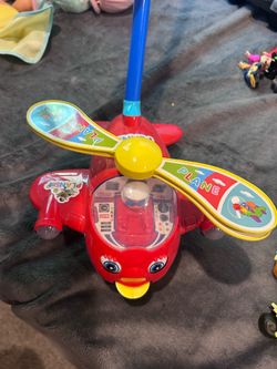Helicopter push toy