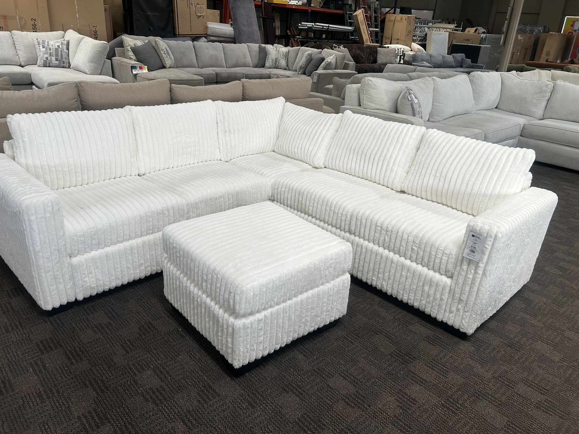 Ivory White Sectional And Ottoman
