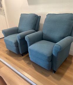 Two really nice blue reclining chairs