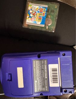 Game boy color with super Mario deluxe