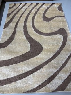 Beige and Brown Swirl Area Rug