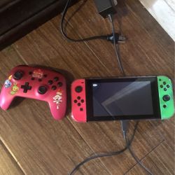 nintendo switch with charge and extra control. all for 170