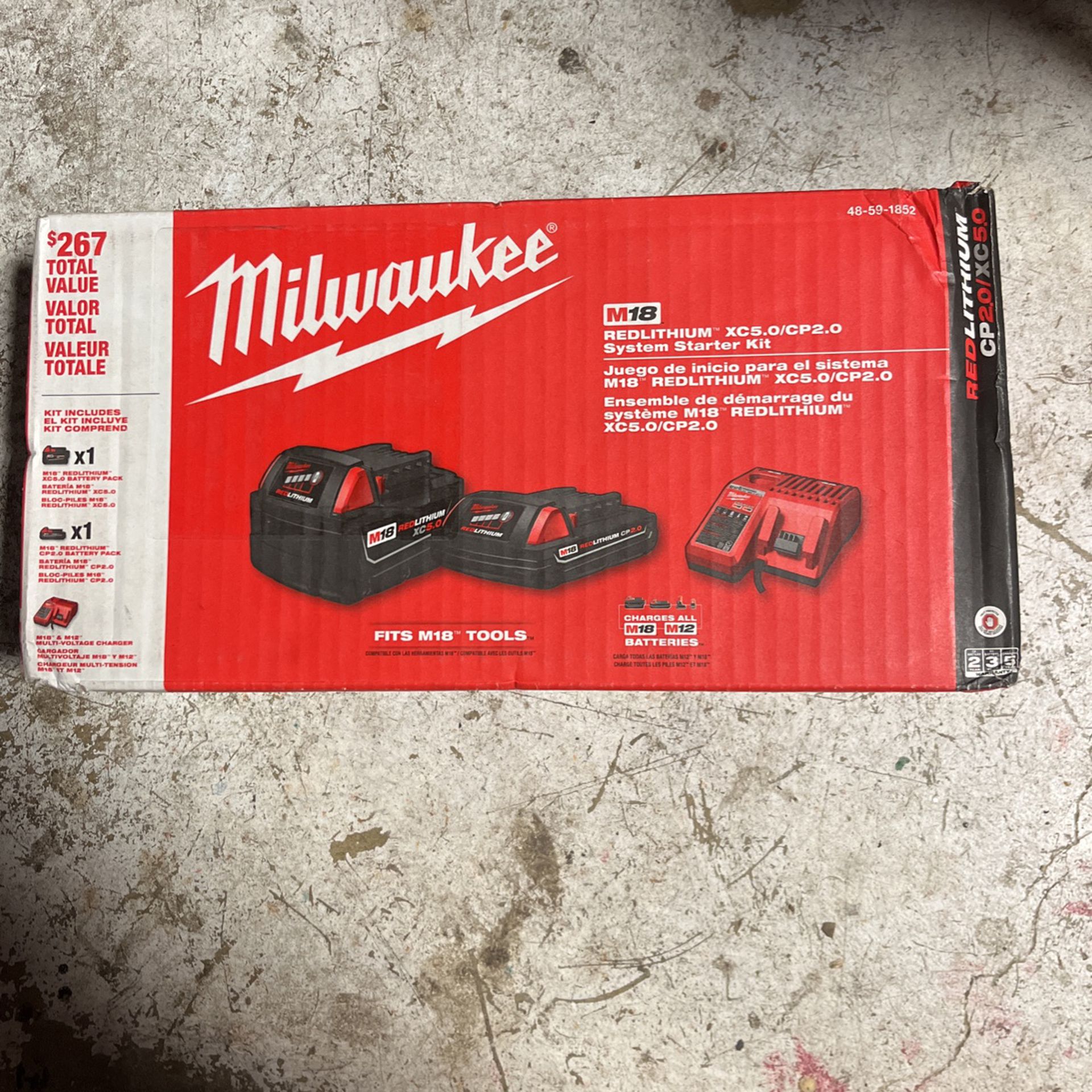 Millwaukee M18 Batteries And Charger 