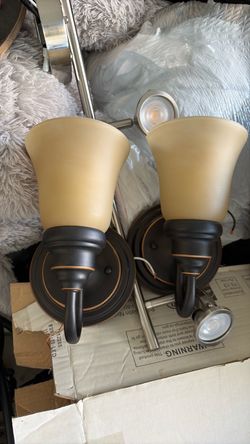Bronze light fixtures for kitchen and bathroom