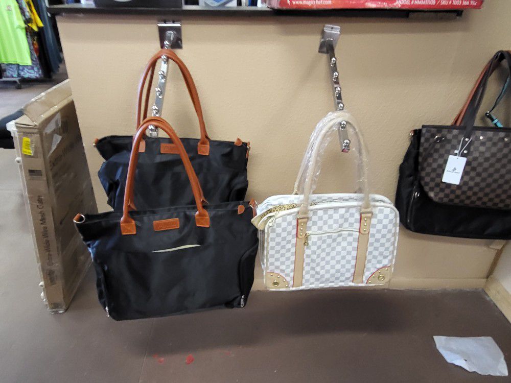 Large travel bag $19 black and 10 pet bag white and tan $35