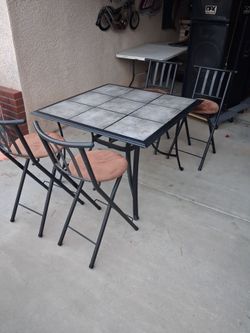 40x40 in table and 4 chairs  $50