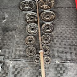 Olympic weights 245lbs plus 7ft 45lbs bar