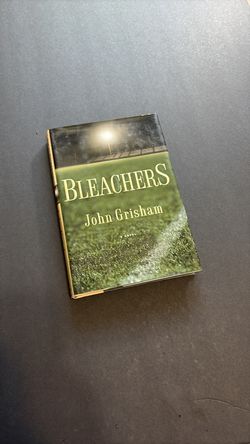 Bleachers by John Grisham . Hard cover used/ Good condition .