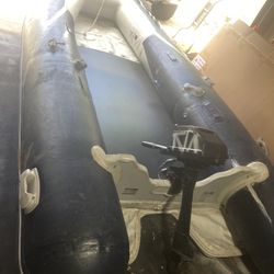 14 Foot West Marine With 5 Hp Air Cooled Outboard 